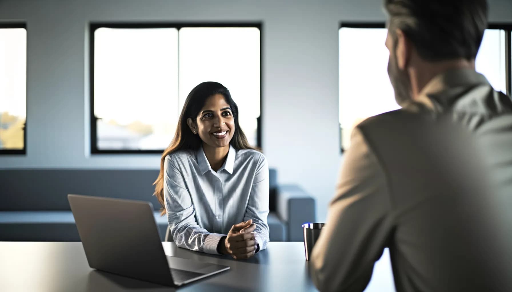 Cybersecurity professional walking a client through their security setup